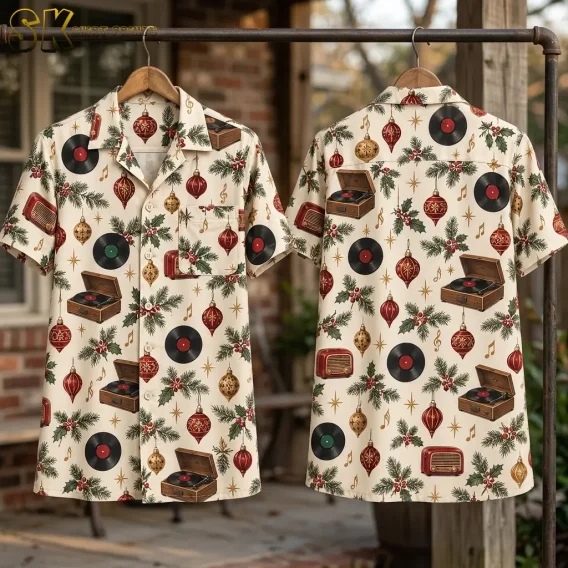 Front and back of the shirt hang on wooden hangers from an iron rack outside, showing the cream base, camp collar, and the full repeating holiday music pattern across both panels.