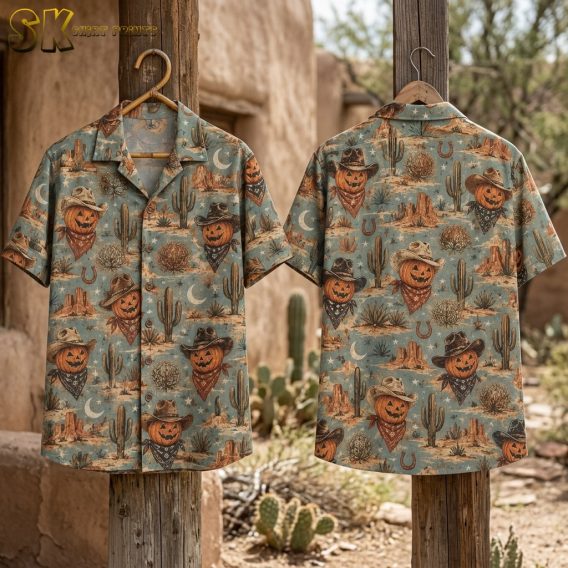 Flat-lay front and back views of the light blue short-sleeve shirt, displaying the evenly spaced repeating pattern of cowboy jack-o'-lanterns alongside tumbleweeds, crescent moons, stars, and desert bushes in a muted Halloween color palette.