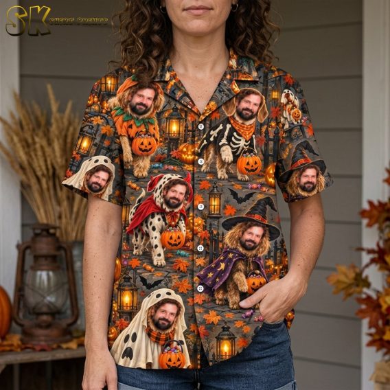 A close-up view of the Halloween dogs Hawaiian shirt on a woman, highlighting the detailed illustration of a bearded dog in a wizard costume with a star-and-moon purple cloak and pointed hat, holding an orange candy bucket, surrounded by glowing lanterns and fall leaves.