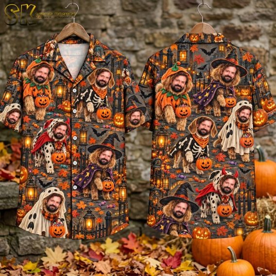 The Halloween dogs Hawaiian shirt laid flat showing both the front and back panels side by side, with the full all-over pattern of costumed bearded dogs, jack-o'-lantern buckets, bats, a wrought iron fence, stone steps, and scattered Halloween candy visible across the dark background.