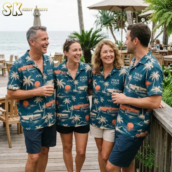 Two men and two women wearing matching custom logo Hawaiian shirts laugh together on a wooden deck overlooking the ocean, each shirt showing the 'YOUR LOGO' text on the front chest.