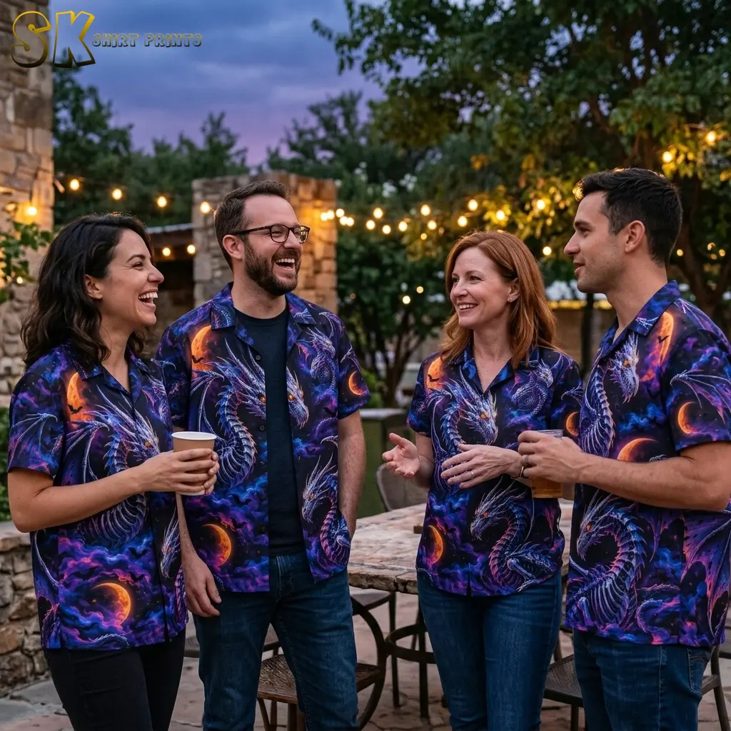 Four adults wearing matching dragon-print shirts gather around a patio table beneath string lights.