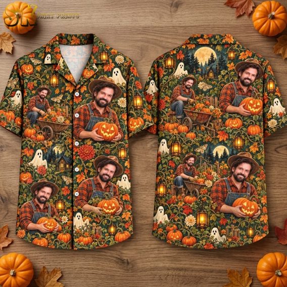 Front and back of a halloween hawaiian shirt laid flat on a wooden surface, showing a dense all-over print of a smiling man in overalls holding a jack-o'-lantern, white ghosts, glowing lanterns, and autumn leaves on a dark green base.