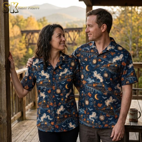 Couple lifestyle photo featuring the navy halloween hawaiian shirt with vintage train, ghost smoke, moon, and pocket watch motifs worn in a casual setting.