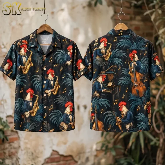 Front and back displays of a black rooster Hawaiian shirt hang on wooden hangers against a weathered plaster and brick wall.