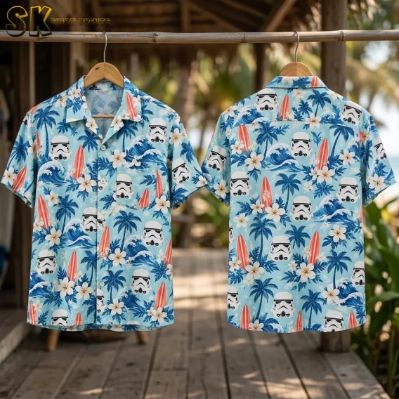 Front and back of a light blue Star Wars aloha shirt hang from a bamboo rail above a wooden deck.