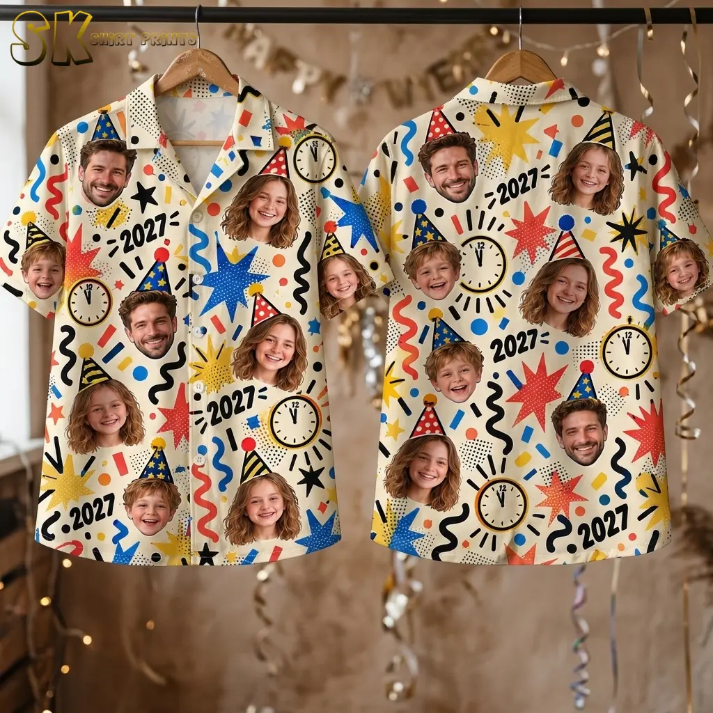 Front and back of the cream 2027 shirt hang side by side on wooden hangers among curling party ribbons.