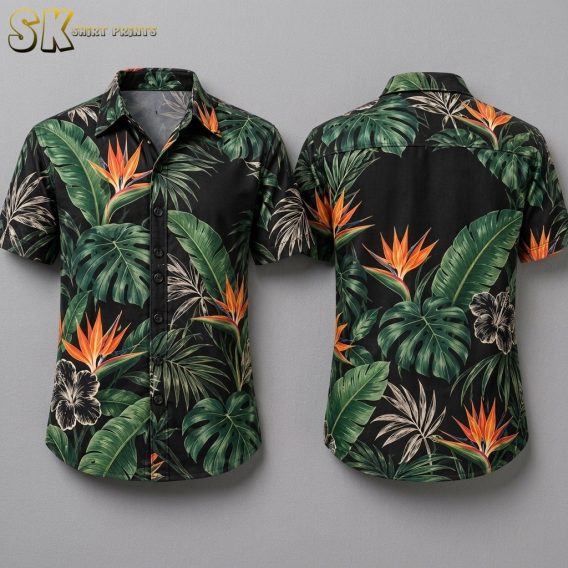 Front and back hanger views of a black short-sleeve button-up shirt printed with large monstera leaves, banana leaves, vivid orange bird of paradise flowers, and cream-toned hibiscus outlines.