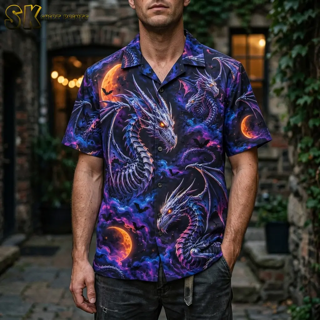 A man wears a purple and black dragon-print shirt with dark jeans in a brick courtyard, with one hand in his pocket.