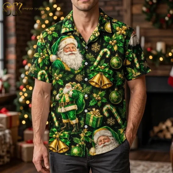 A man wears a black Santa aloha shirt with green Santa figures and gold bells in front of a lit Christmas tree.