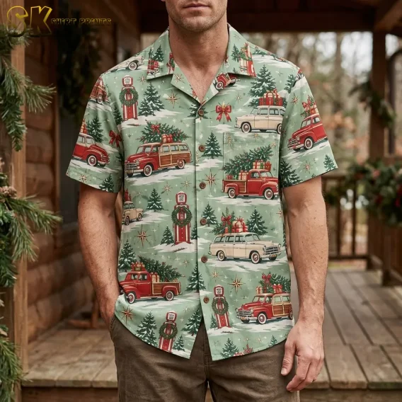 A man stands on a wooden cabin porch wearing the mens christmas hawaiian shirt, with the vintage red woody wagon and evergreen tree print clearly visible across the chest.