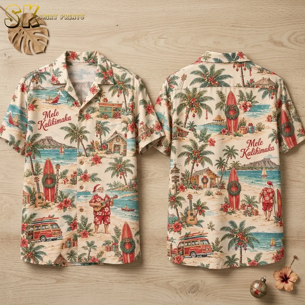 Front and back of a cream Christmas Hawaiian shirt lie on pale wood, showing red Mele Kalikimaka lettering and wreath-decorated surfboards.