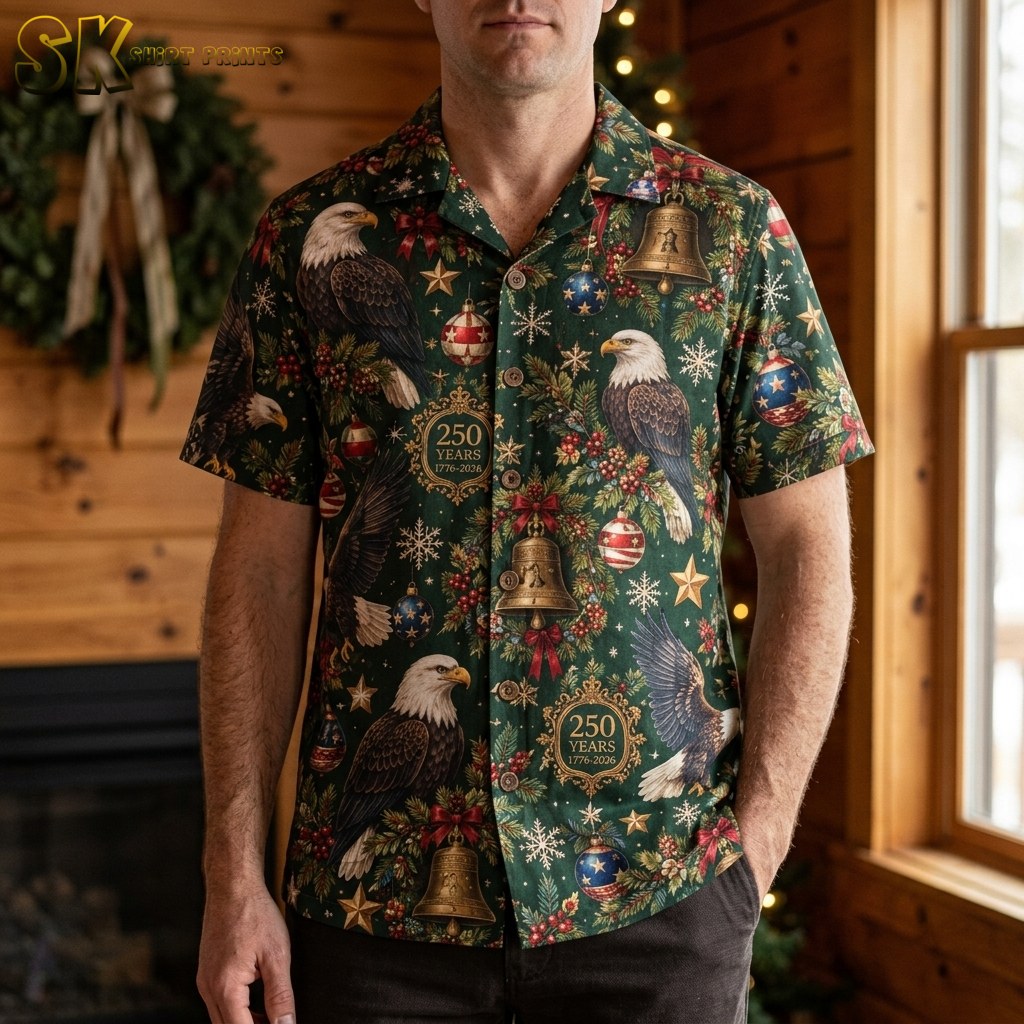 A man wearing the dark green short-sleeve button-up shirt with bald eagle and Christmas decoration motifs, shown in a lifestyle setting.