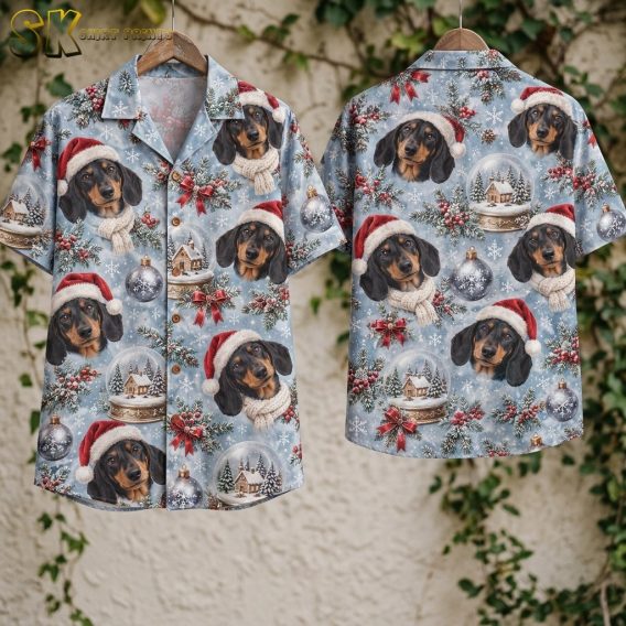 Front and back of a christmas santa hawaiian shirt hang against a vine-covered stone wall, displaying the dachshund-in-Santa-hat repeat pattern and the camp collar construction on both sides.