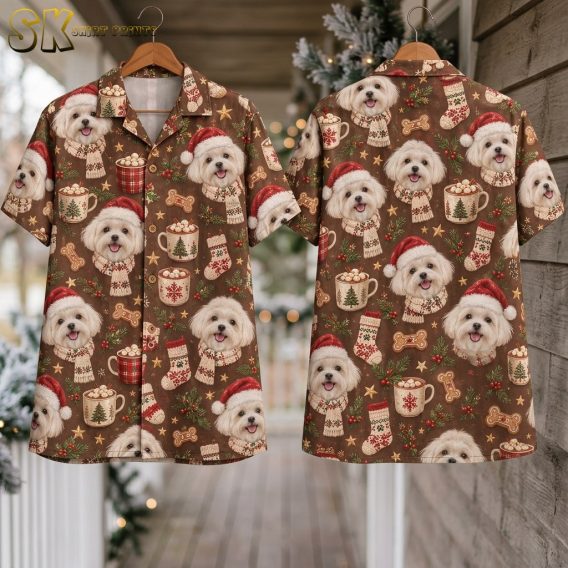 The santa hawaiian shirt hangs on a wooden hanger on a snowy porch, showing both the front and back panels with repeating white Maltese dogs in red Santa hats, holiday mugs, and gingerbread bones against the brown background.