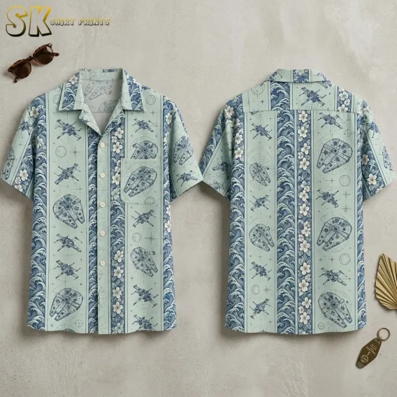 A seafoam green Star Wars Hawaiian shirt is laid out front and back, showing spacecraft drawings between blue wave and white flower stripes.