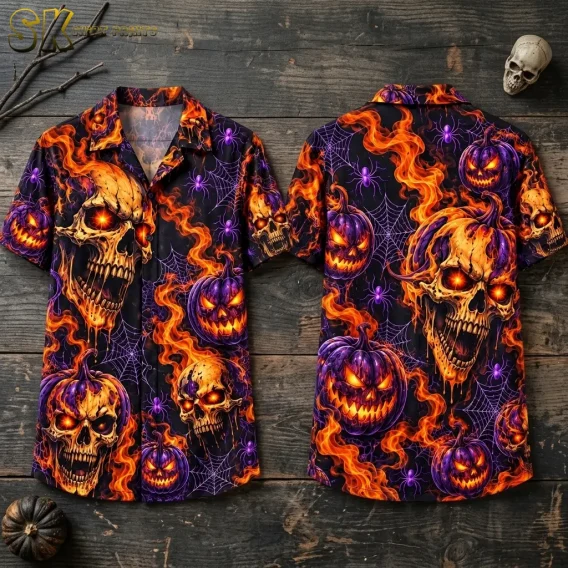 A black Halloween Hawaiian shirt is displayed front and back on dark wood, showing orange skulls, purple jack-o’-lanterns, and flames.