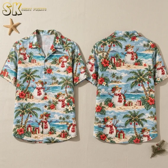 Front and back of a light blue short-sleeve shirt with beach snowmen and decorated palm trees against a beige background.