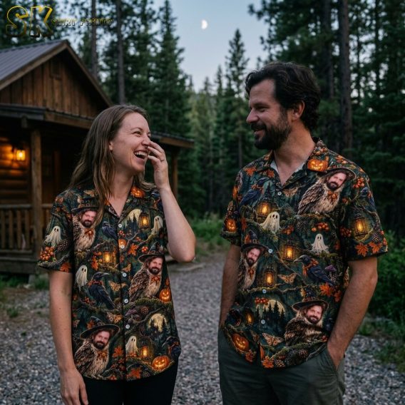 A couple shown together in a lifestyle setting, with at least one person wearing the short-sleeve Halloween aloha shirt featuring the dark green owl-face and pumpkin print.