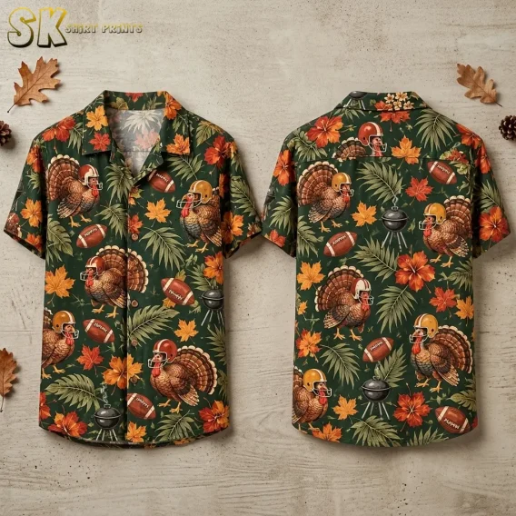 Front and back of a dark green shirt with helmeted turkeys, footballs, and fall foliage, displayed against a light textured background.