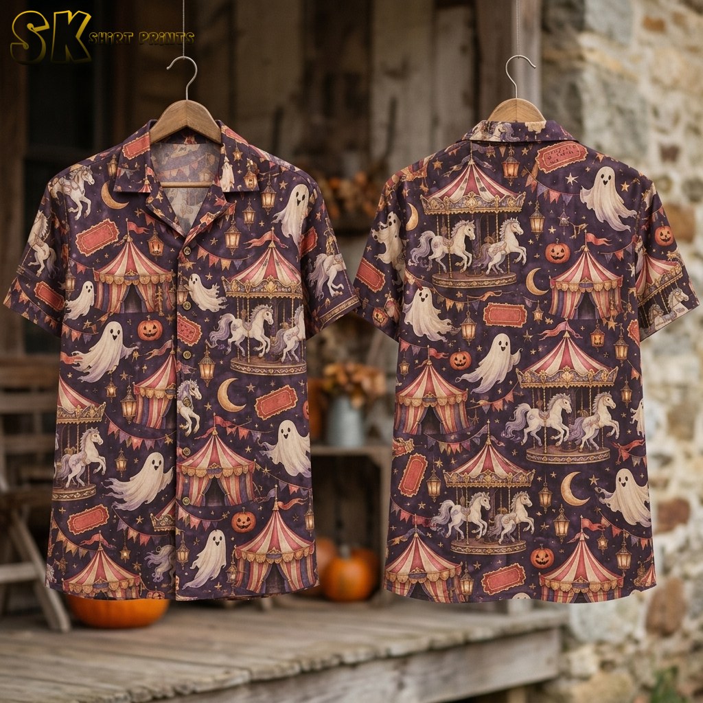 Flat-lay view of the shirt's front and back laid out flat, showing the even distribution of carousel horses, striped circus tents, jack-o'-lanterns, ticket stubs, and star clusters across the dark purplish-brown fabric.