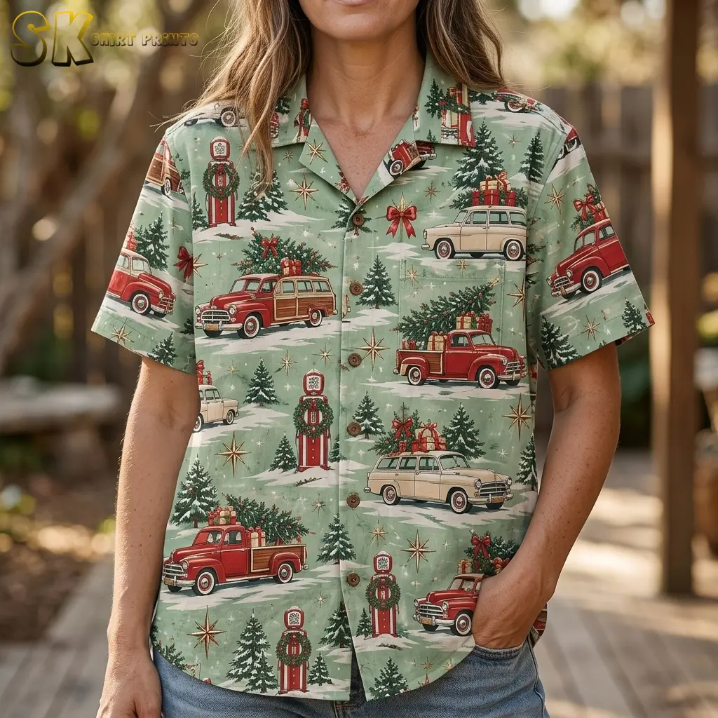 A woman outdoors wears the christmas hawaiian shirt, with the beige vintage station wagon, red pickup truck, and golden starburst motifs filling the frame at close range.