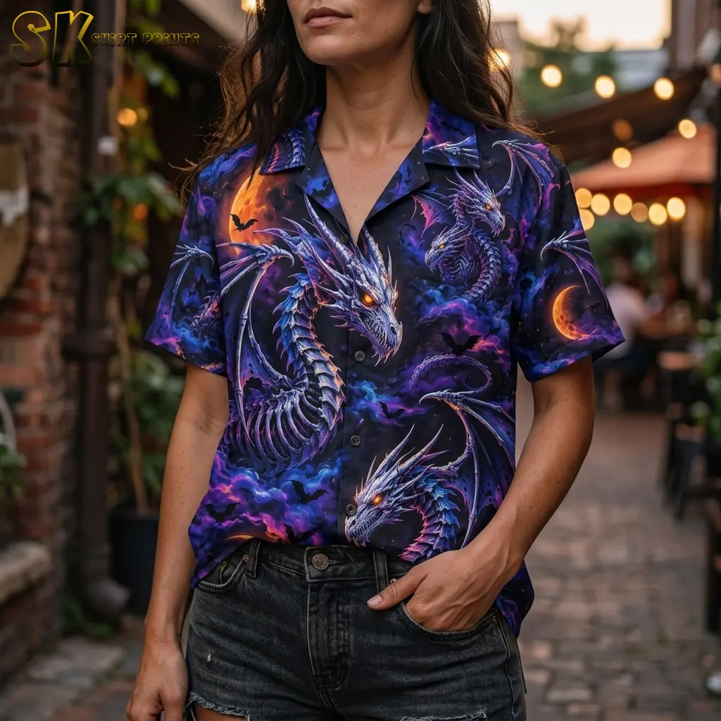 A woman wears a dragon-print camp-collar shirt partially tucked into black denim shorts, showing orange eyes and purple wings.