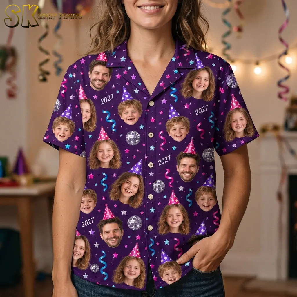 A woman wears a purple button-up shirt with large face cutouts, illustrated party hats, and white 2027 lettering.