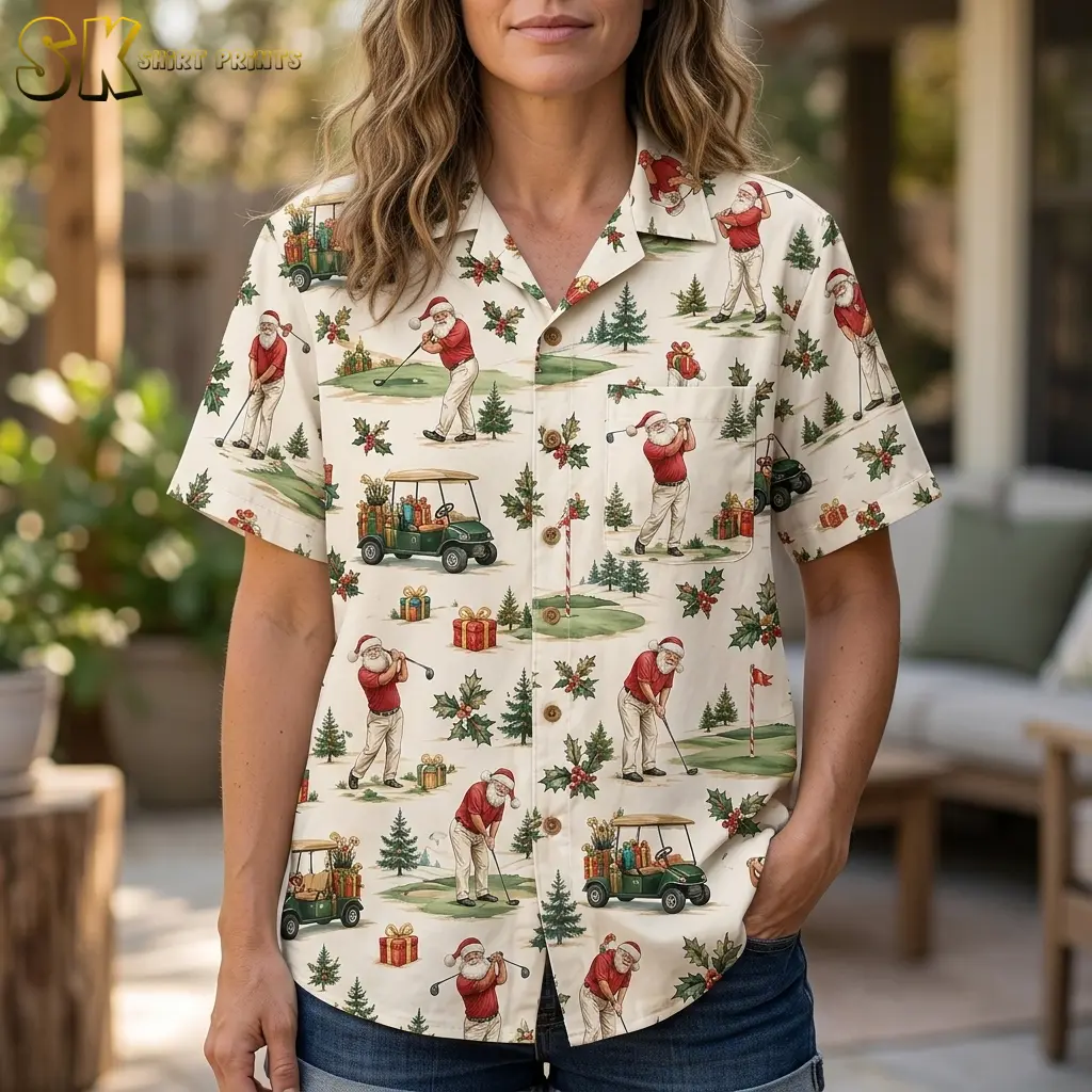 A woman wears a cream Santa golf-print shirt with denim shorts, showing the collar, buttons, and chest pocket in close-up.