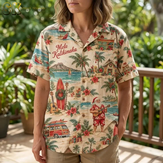 A woman wears the cream Hawaiian Christmas shirt on a leafy deck, showing a wreath-decorated red surfboard and Santa playing a ukulele.