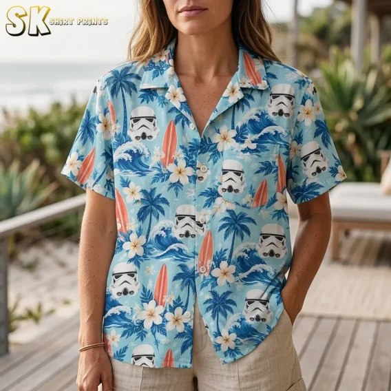 A woman wears a light blue stormtrooper-print button-up shirt, with the collar, chest pocket, and white buttons visible up close.