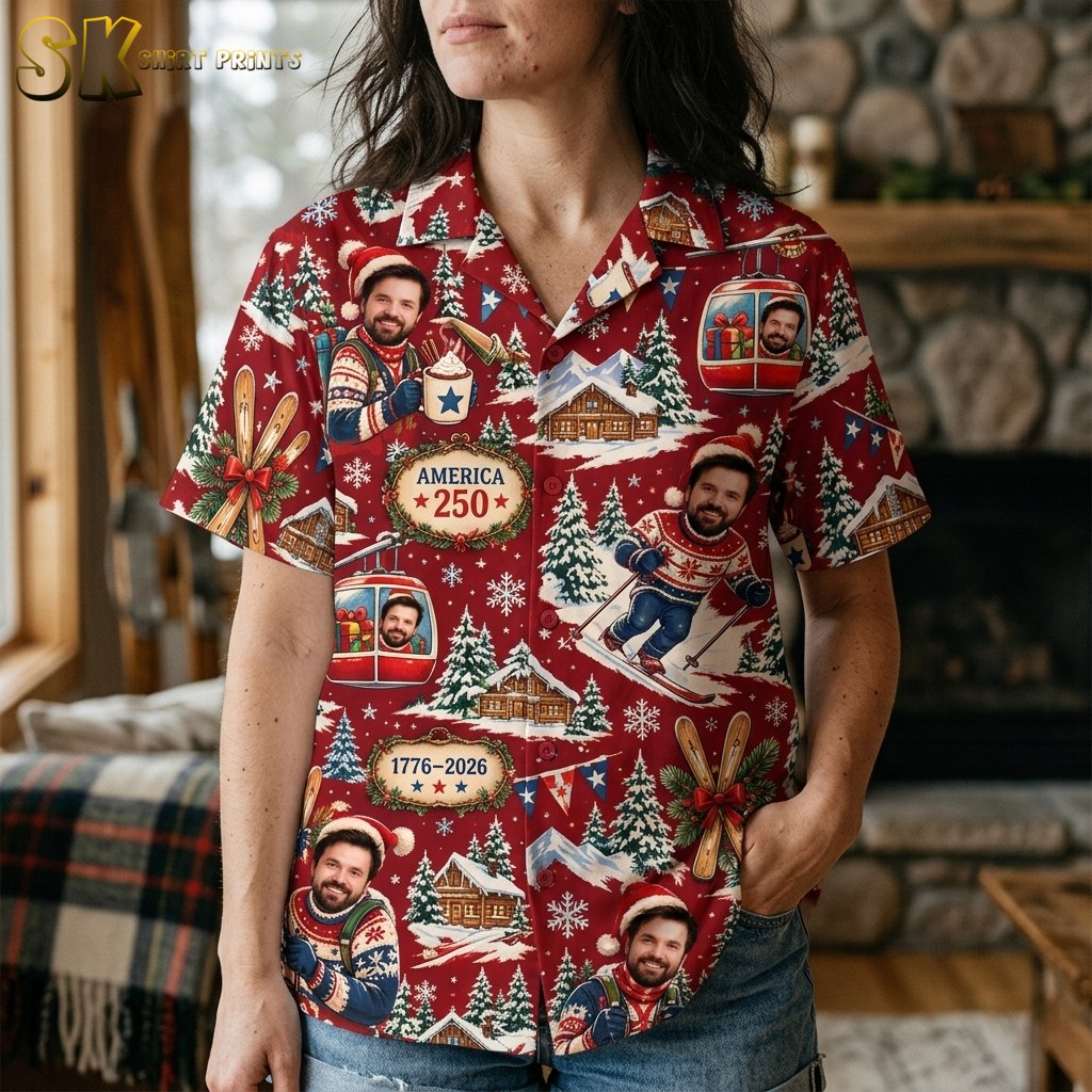A woman wearing the red shirt is photographed from the collar to the waist, bringing the America 250 badge, gondola graphic, and photographic face prints into sharp focus.