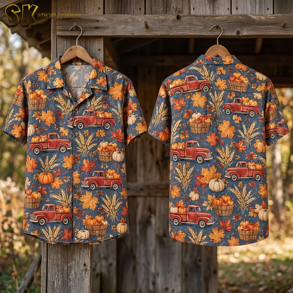 Front and back displays of a pumpkin truck shirt hang on wooden hangers from a weathered wooden beam.